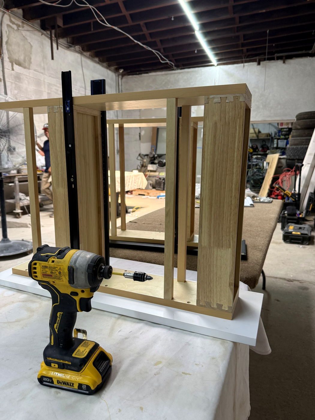 Assembled cabinet boxes squared up in the workshop