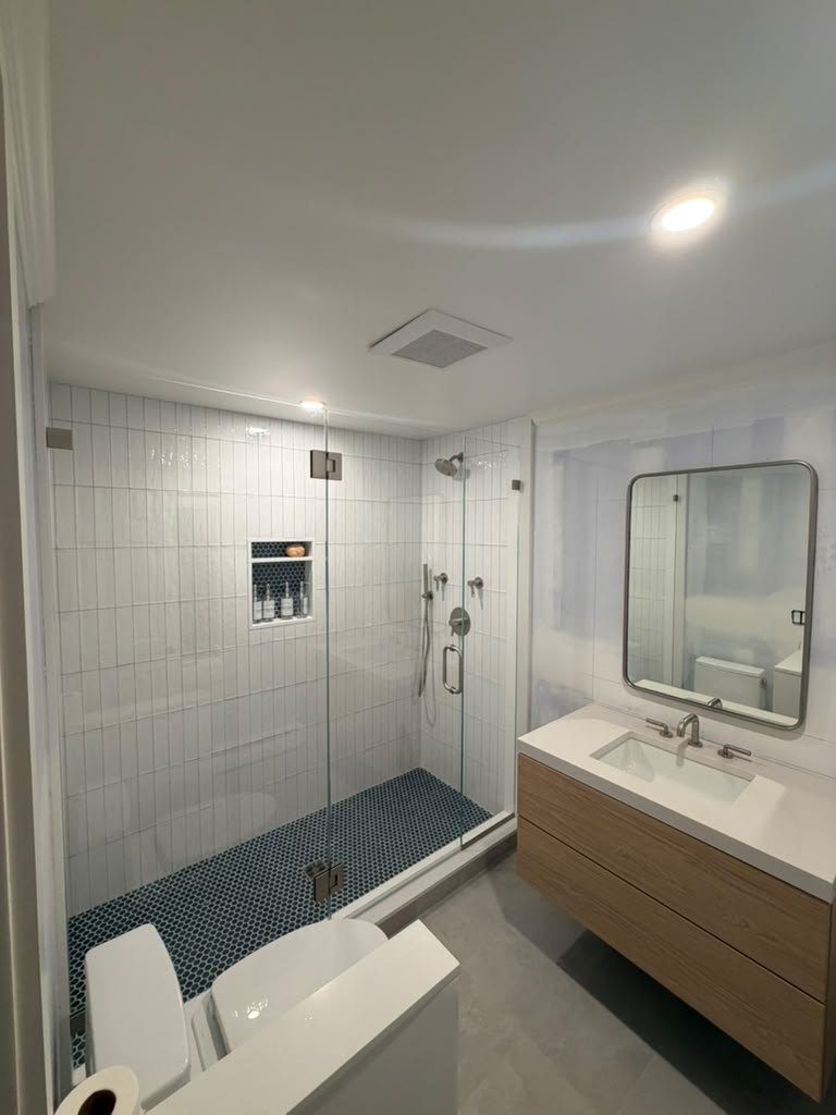 Bathroom vanity with a white stone vanity top