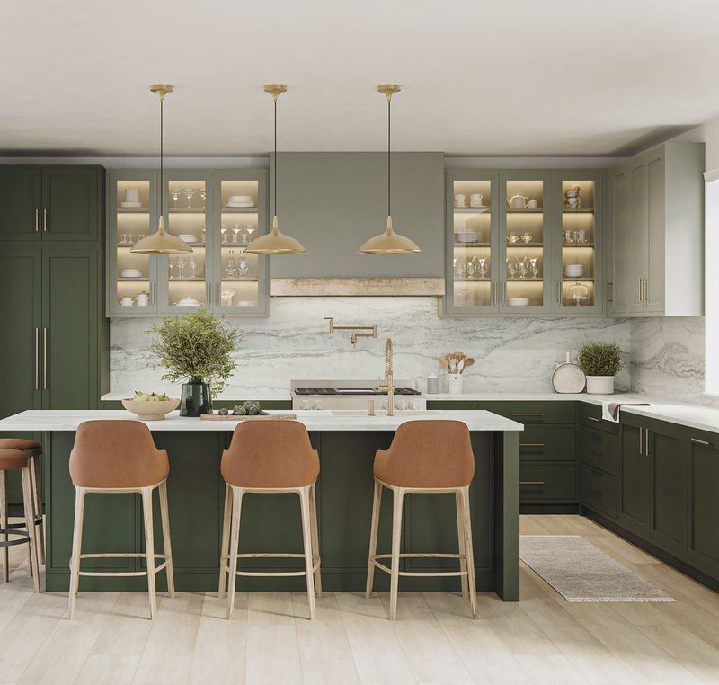 Deep green kitchen with glass upper cabinets and brass pendants